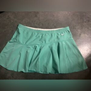 Nike Athletic Skirt Dri-Fit Teal Size Medium but fits like a large.